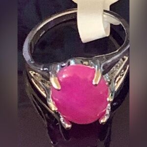 Gemstone hot pink and silver ring, it’s gorgeous fits like a size 8! Like new